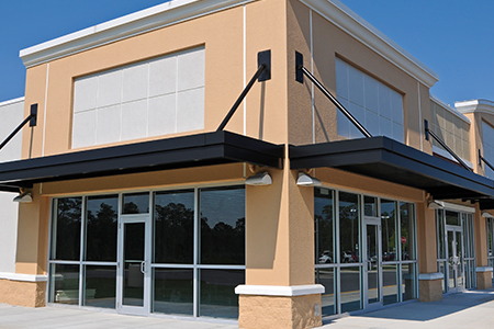 Owasso Commercial Pressure Washing: How Heavy Clay Dust & Mold Impact Retail Storefronts