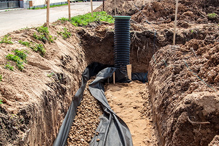 The Homeowner’s Guide to Oklahoma Landscape Drainage: Preventing Foundation Damage